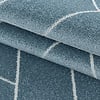Retro vloerkleed - Stencil Triangle Blauw Wit